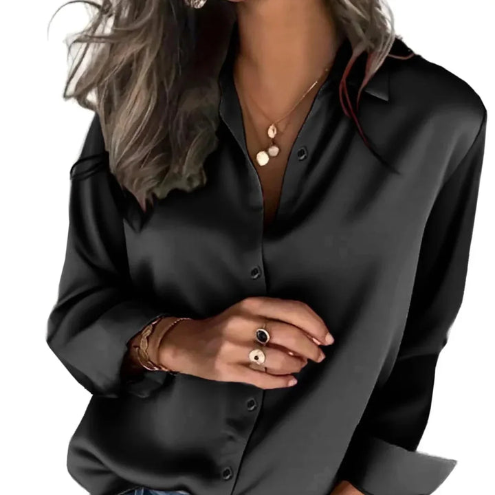 Versatile women's long sleeve button down blouse, ideal for a casual chic or professional workwear look.
