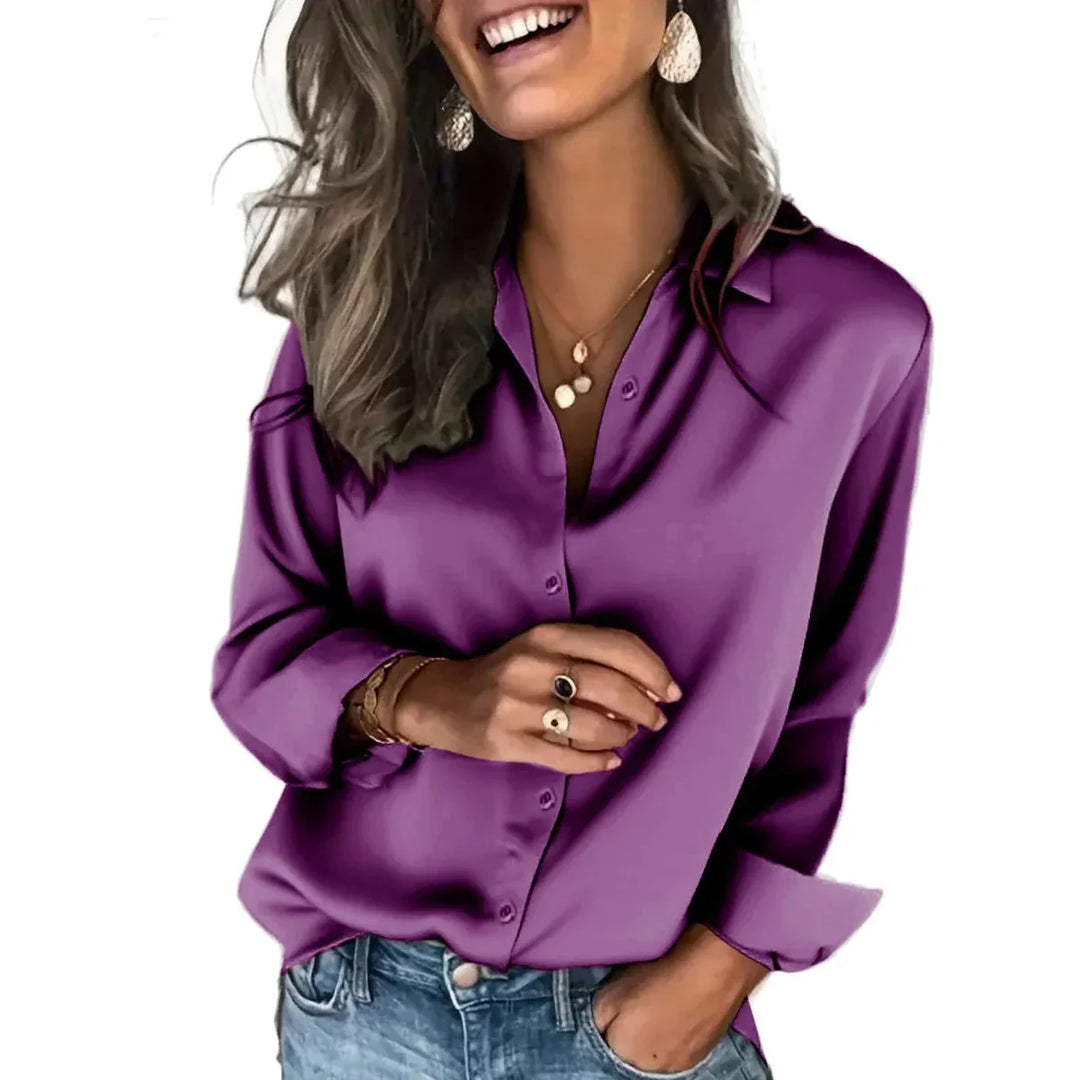 Fashionable women's relaxed fit blouse, a versatile long sleeve button down for effortless elegance.