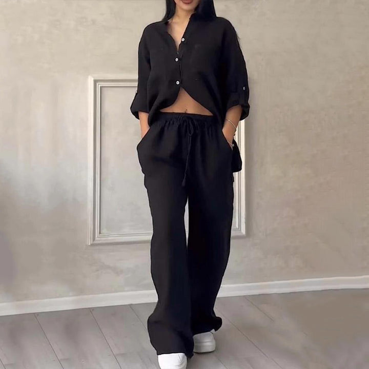 Versatile women's two-piece set: relaxed fit button down shirt & wide leg pants. Perfect for casual comfort.