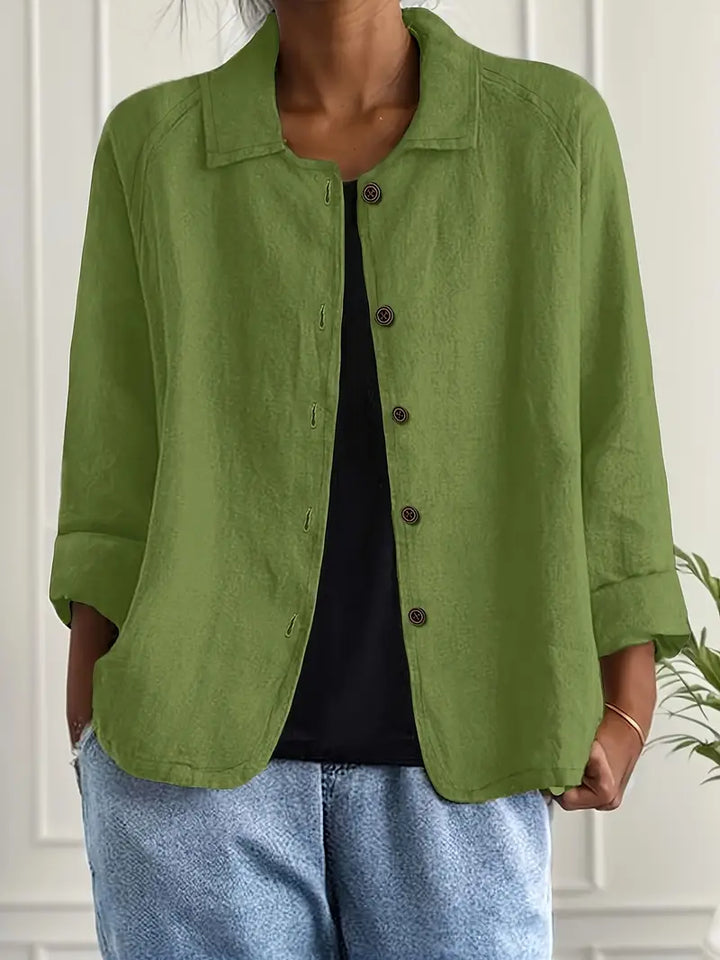 Lightweight women's relaxed fit summer top, button-front, 3/4 sleeves, perfect for casual warm weather looks.