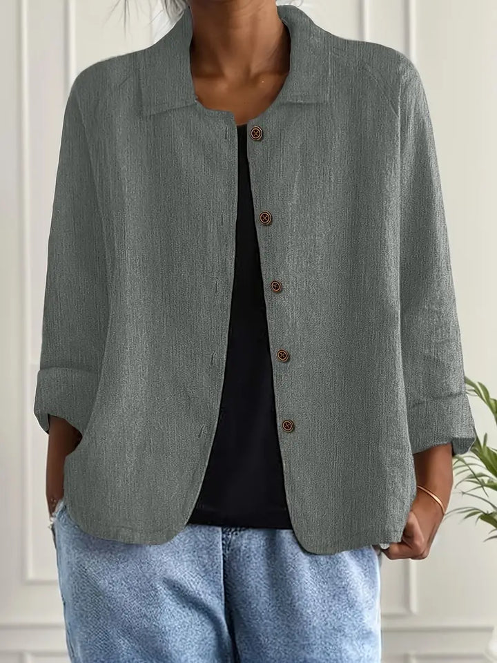 Women's relaxed fit 3/4 sleeve button-front collared casual top, versatile everyday fashion apparel.
