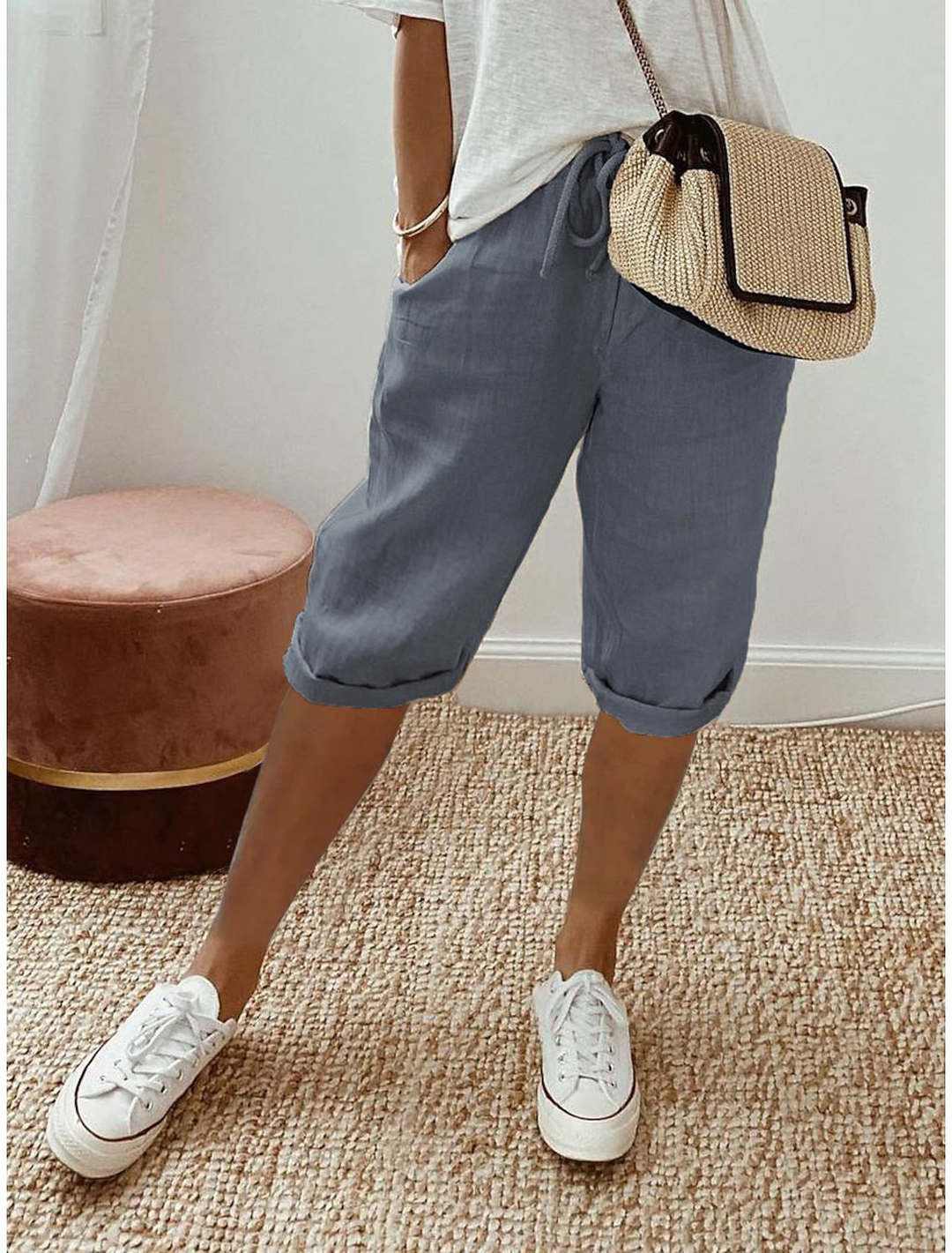 Stylish women's mid-calf capri trousers, relaxed fit with elastic waist for comfort.