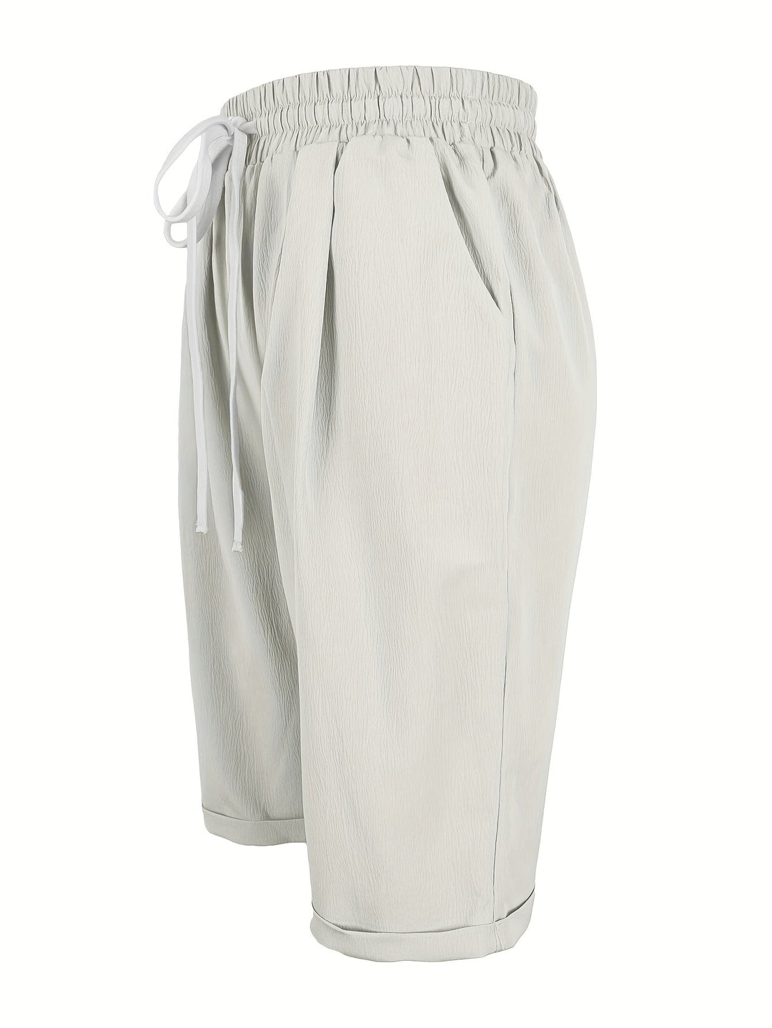 Relaxed fit women's capri trousers, comfortable elastic waist, perfect for casual summer days.