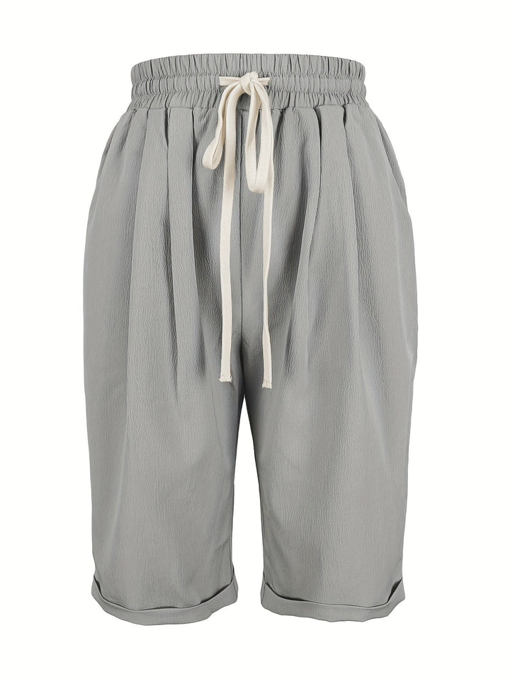 Women's comfortable relaxed fit capri trousers with elastic waist for casual summer wear.