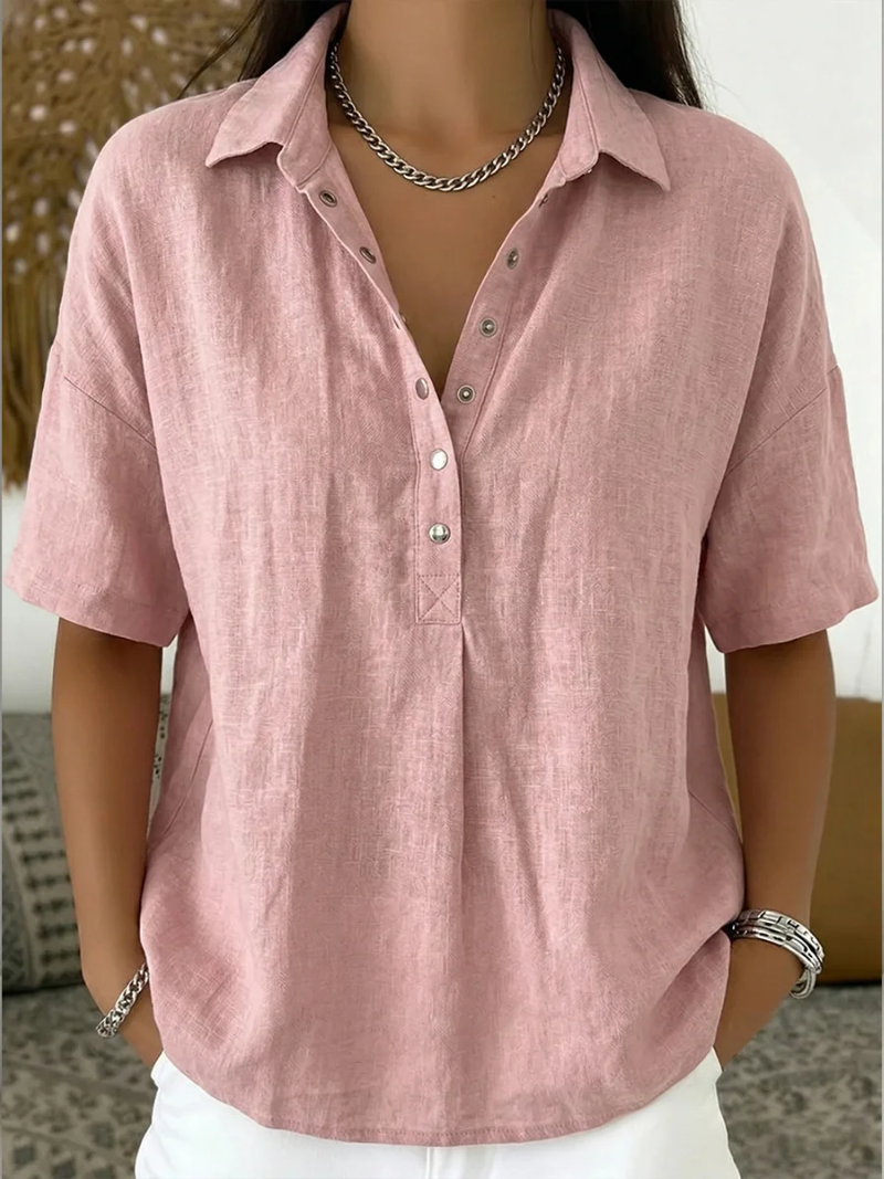 Casual women's collar shirt with elegant button detail. A comfortable, relaxed fit top for spring fashion.
