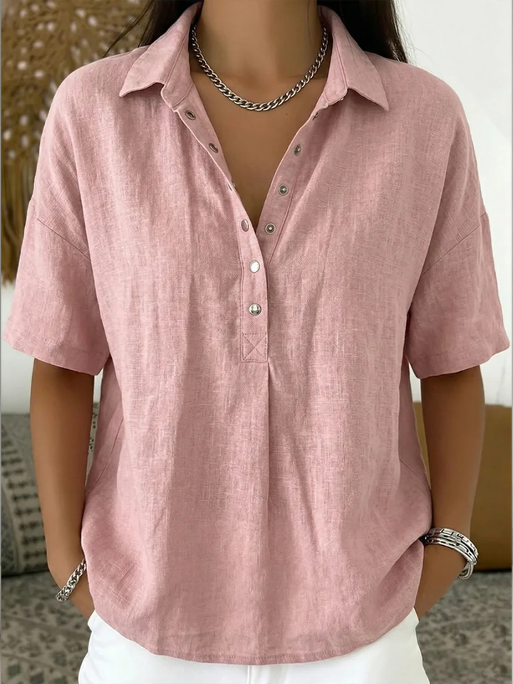 Casual women's collar shirt with elegant button detail. A comfortable, relaxed fit top for spring fashion.