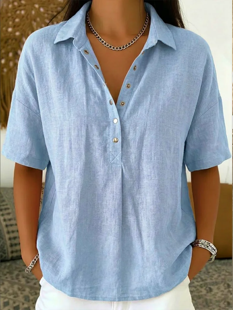 Relaxed fit women's collar shirt with button accents. Your go-to versatile casual top for warm weather style.