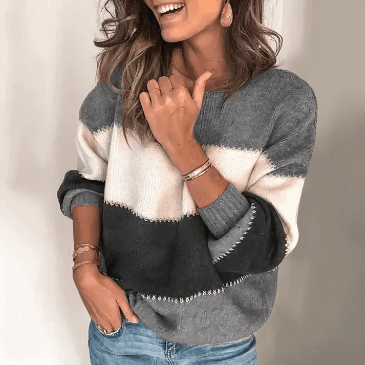 Comfortable women's relaxed fit crew neck sweater. Versatile long sleeve knit for casual fall & winter style.