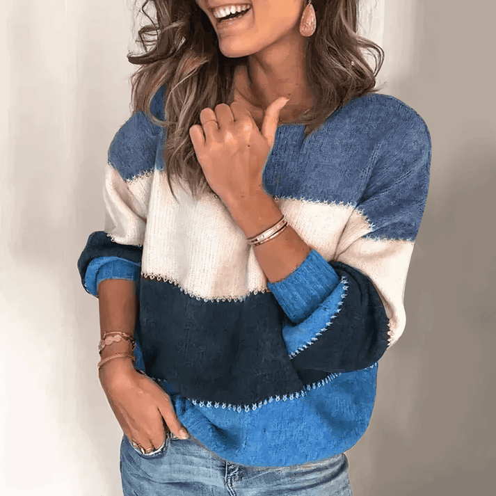 Women's relaxed fit crew neck sweater with ribbed cuffs. A comfortable & stylish long sleeve knit for daily wear.
