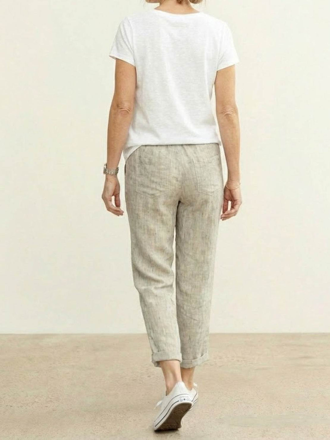 Comfortable women's drawstring pants, relaxed fit with cuffed hem for everyday wear.