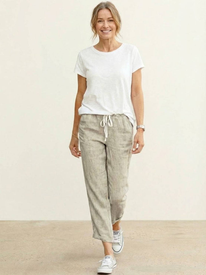 Versatile women's cuffed pants, travel friendly and ideal for warm weather comfort.