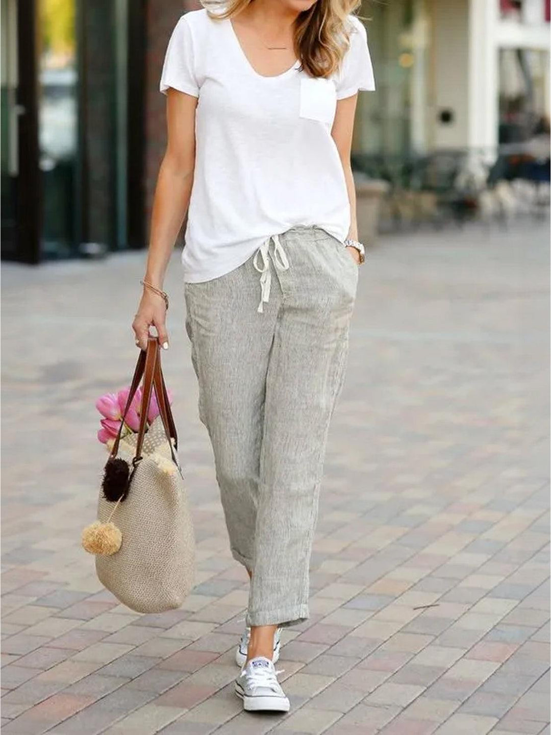 Effortless women's summer style pants, relaxed fit with drawstring and cuffed hem.