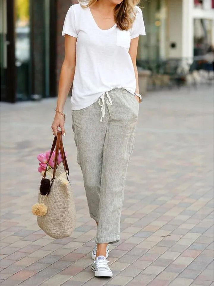 Effortless women's summer style pants, relaxed fit with drawstring and cuffed hem.