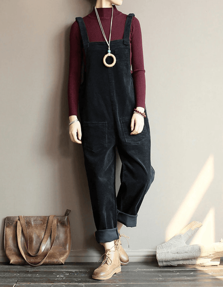 Comfortable women's wide leg dungaree jumpsuit with practical pockets, perfect for autumn layering.