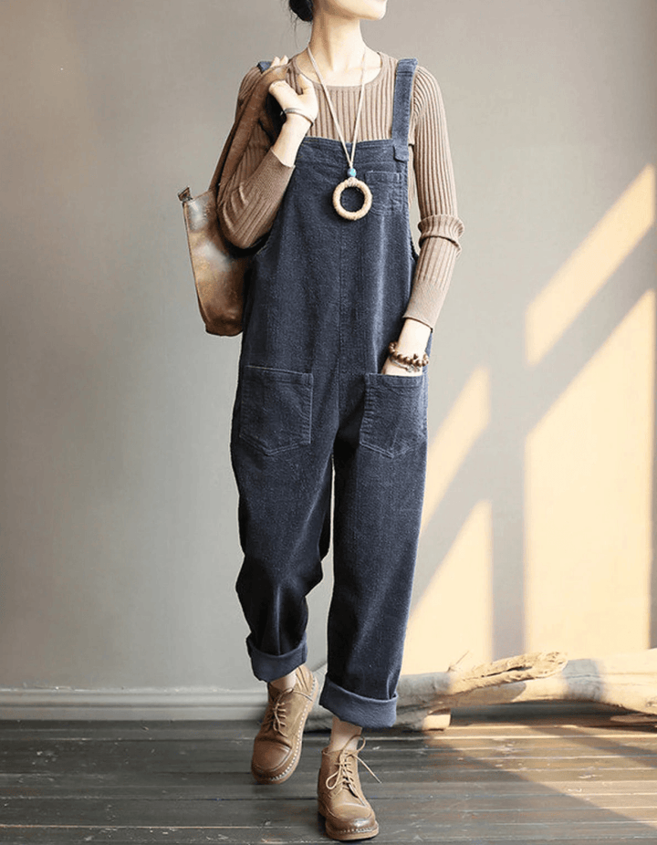 Stylish women's dungaree jumpsuit, relaxed fit and wide leg design for comfortable autumn fashion.