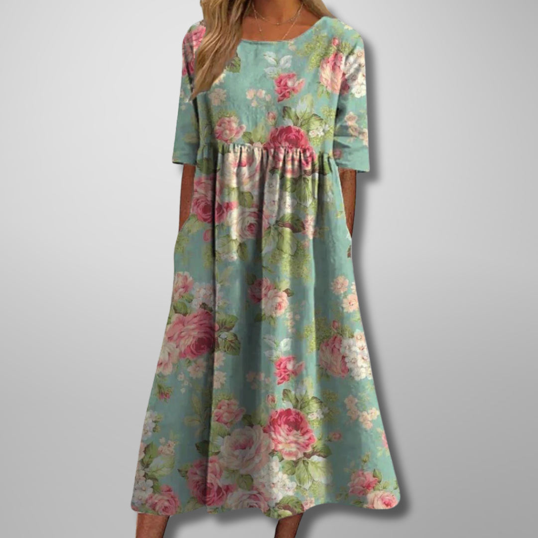 Flowy floral midi dress for women, ideal for casual summer days and relaxed spring fashion.