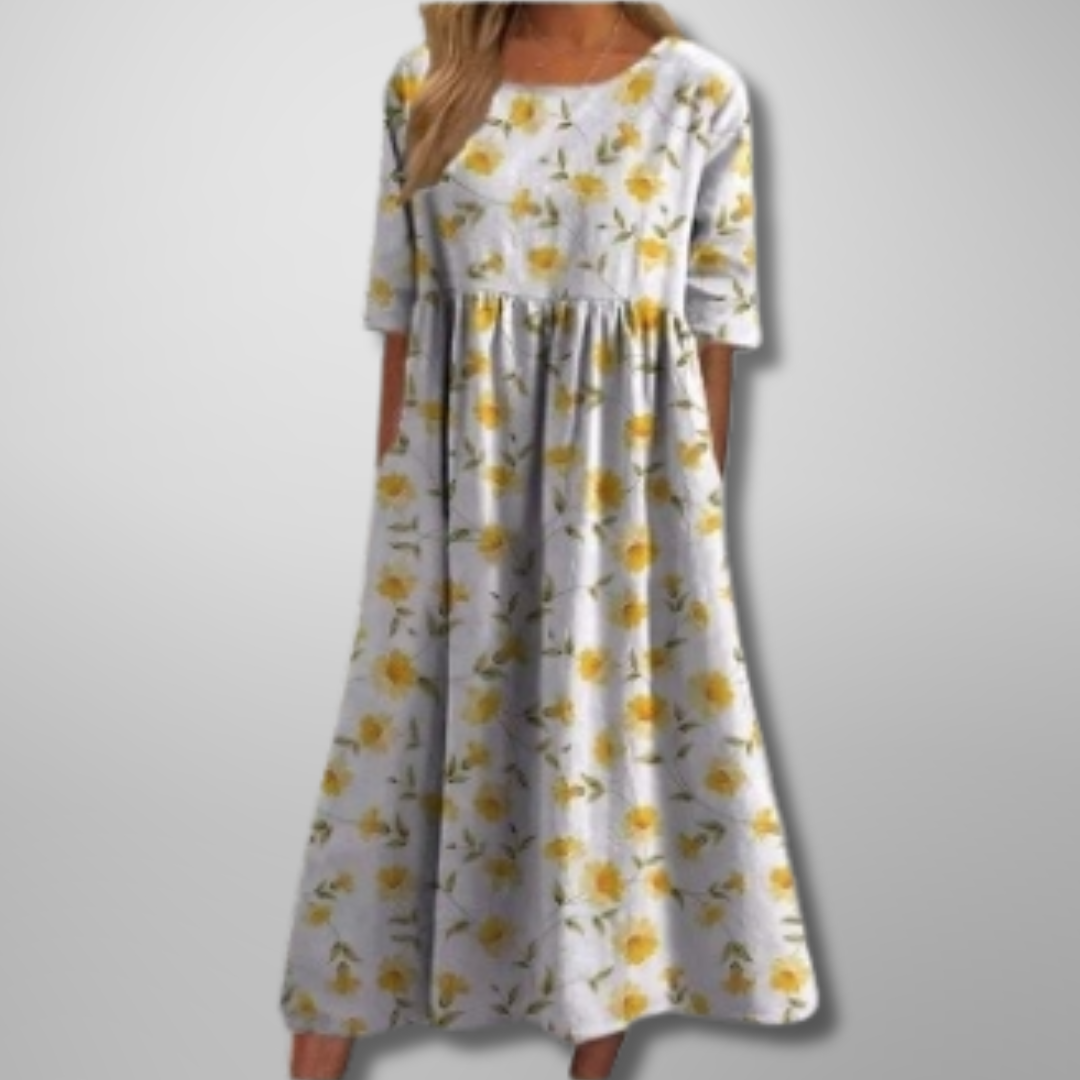 Beautiful women's floral midi dress with a relaxed silhouette, perfect for warm weather comfort.