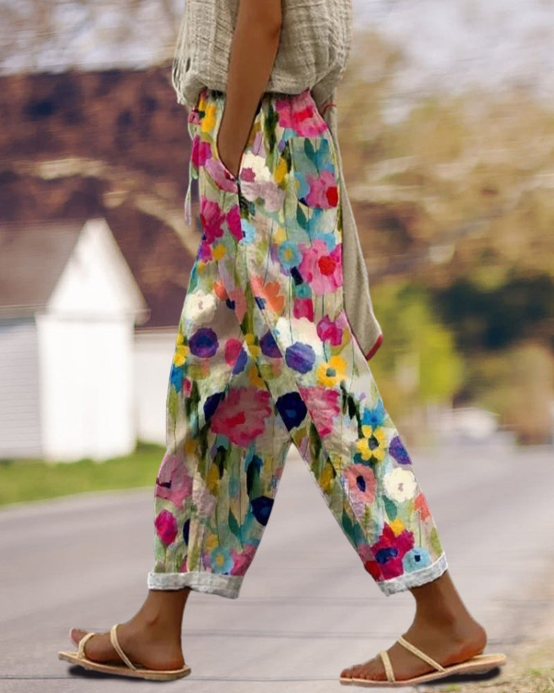 Boho style women's floral print wide leg trousers, ideal for vacation wear and relaxed summer fashion.