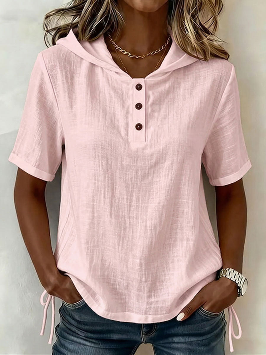 Stylish women's hooded button-up shirt with a relaxed fit, perfect for everyday casual wear.