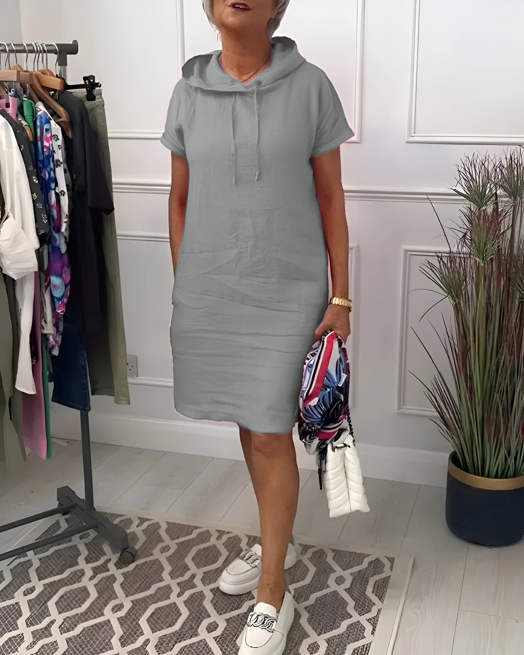 Women's relaxed fit summer hoodie midi dress, offering casual style and ultimate comfort.