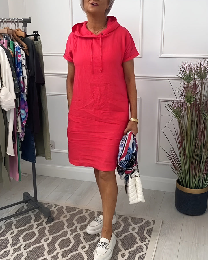 Relaxed fit women's midi dress with a hood, a versatile & comfortable casual wear option.