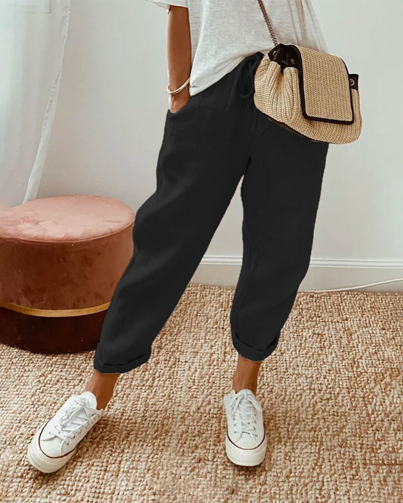 Stylish women's drawstring linen jogger pants, showcasing breathable fabric & relaxed fit for everyday comfort.