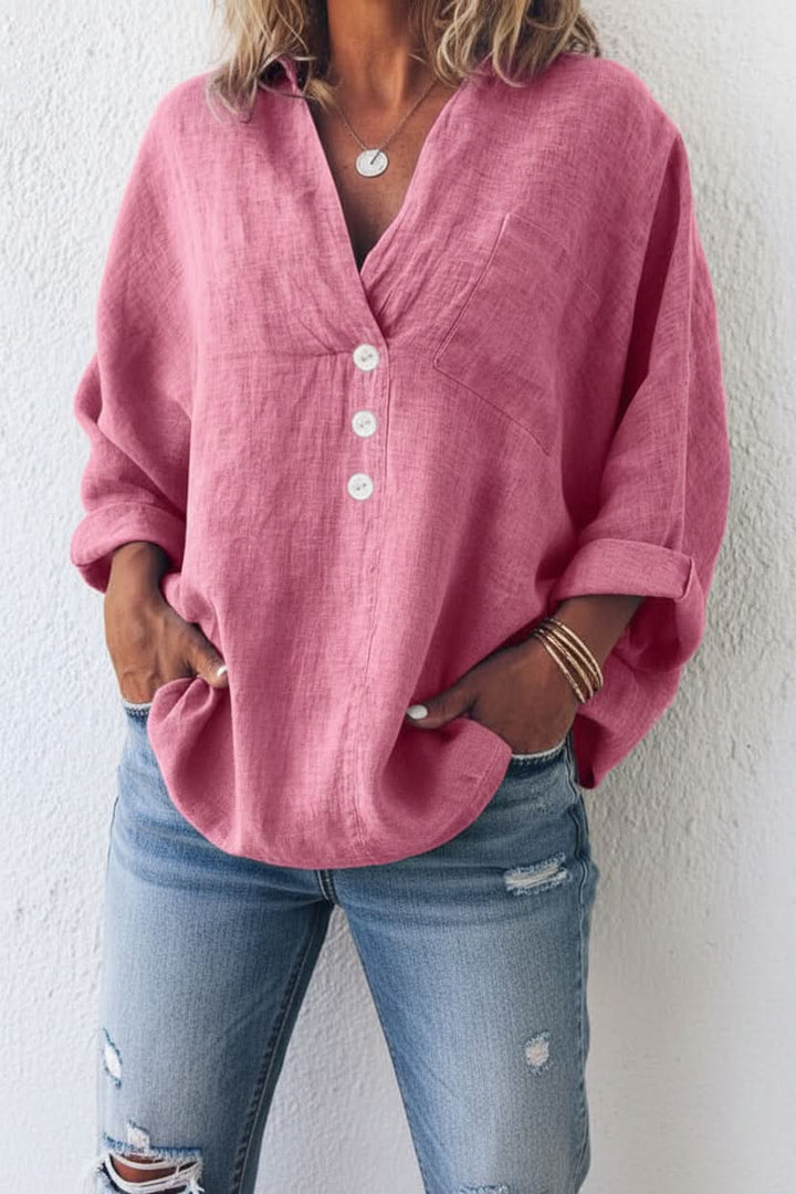 Women's relaxed fit long sleeve top with an elegant open back design, perfect for chic summer fashion.