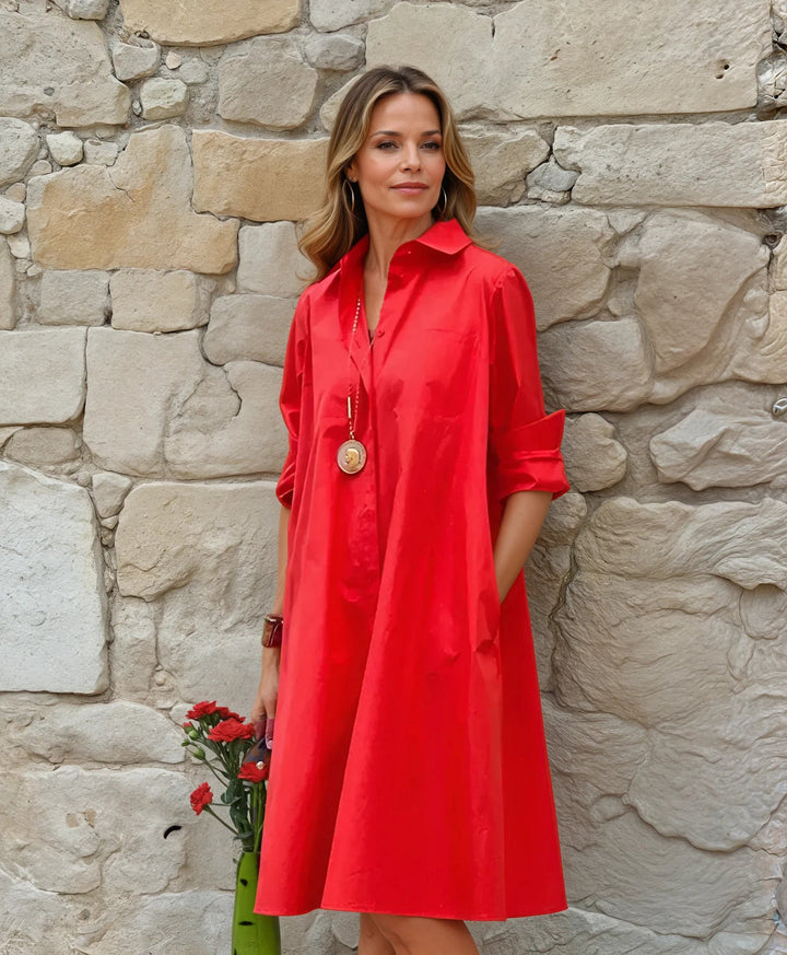 Versatile women's midi shirt dress. Relaxed fit, button-down, and practical pockets. Perfect for casual or office wear.