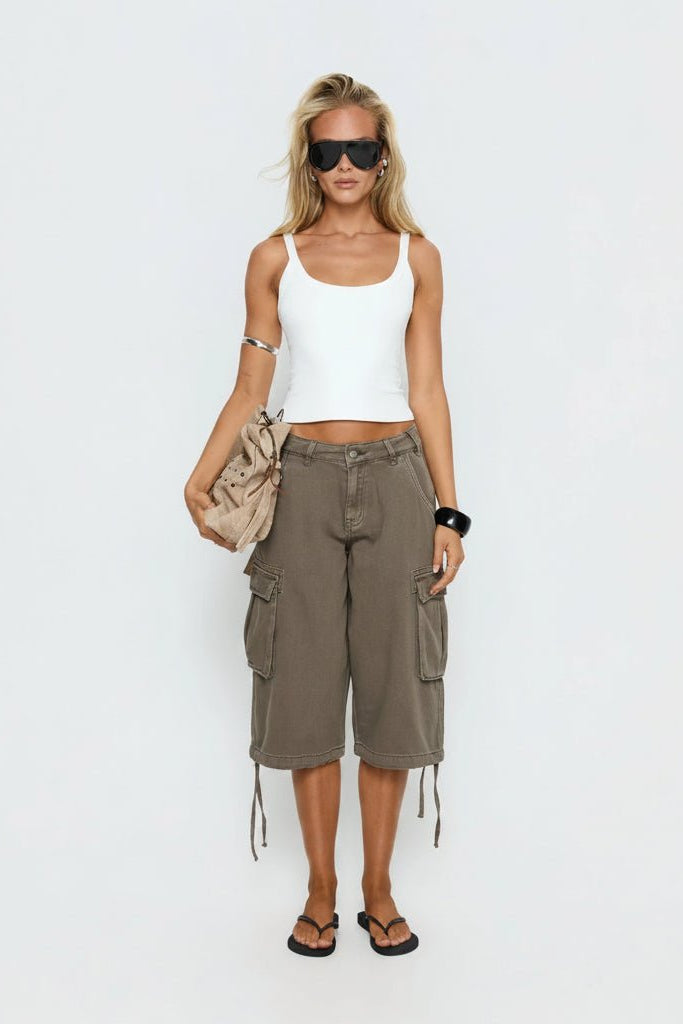 Women's relaxed fit mocha cargo capris with functional pockets, perfect for casual summer wear.