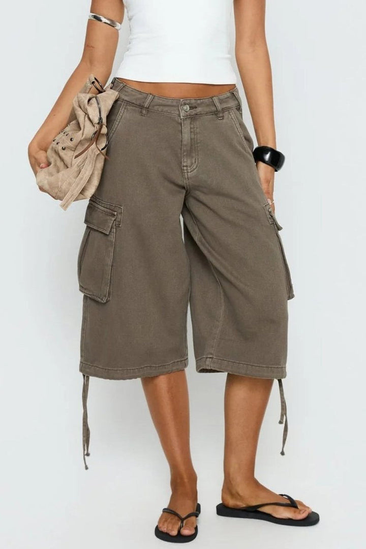 Model wearing stylish mocha relaxed cargo capris, mid-calf length, ideal comfortable summer bottoms.