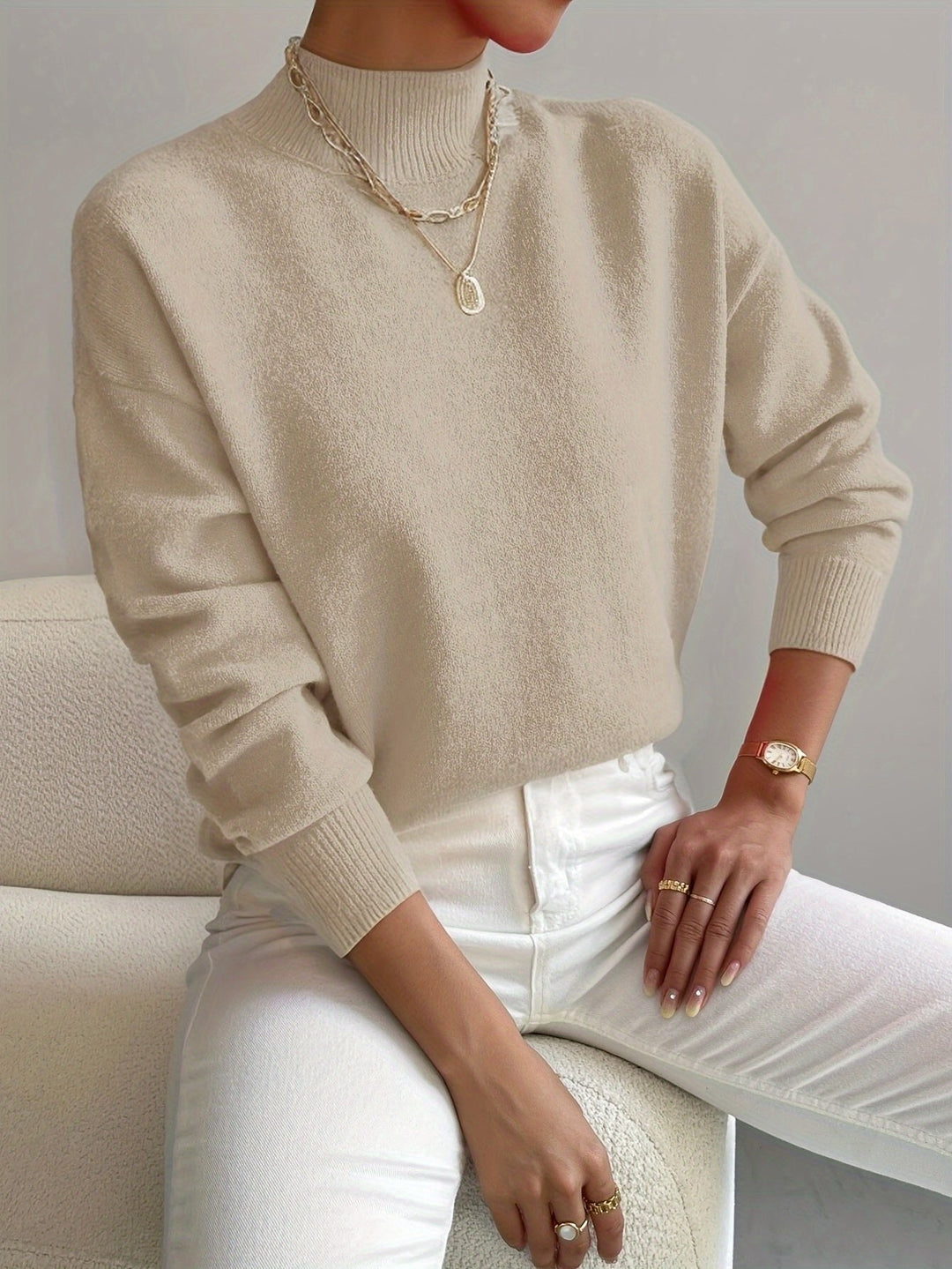 Soft women's relaxed fit mock turtleneck sweater with long sleeves. Comfortable pullover for fall & winter fashion.