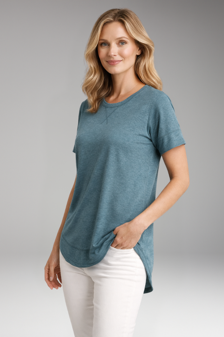 Soft fabric close-up of a women's comfortable relaxed fit round neck t-shirt with a flattering curved hem.