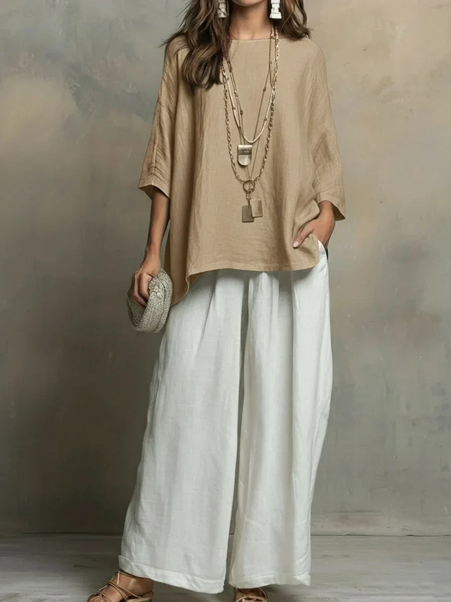 Comfortable women's two-piece set: relaxed shirt and wide leg pants, perfect for everyday style or vacation.