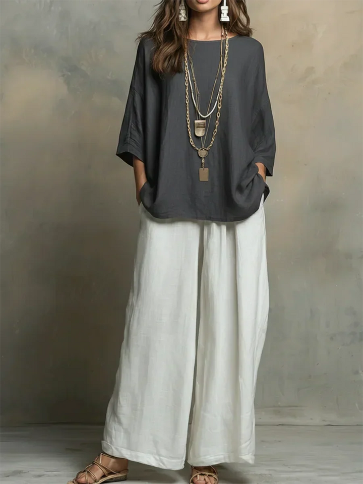 Relaxed fit women's shirt and wide leg pants set, a comfortable and chic option for summer vacation wear.
