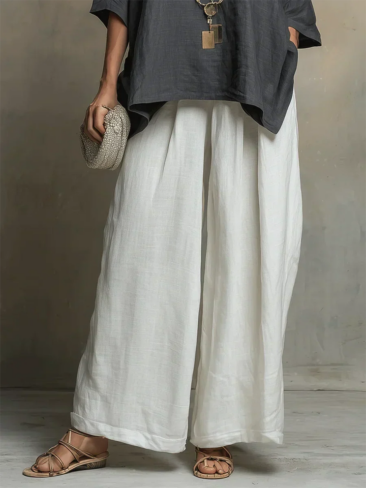 Versatile women's relaxed fit shirt and wide leg pants matching set, perfect for a comfortable vacation outfit.