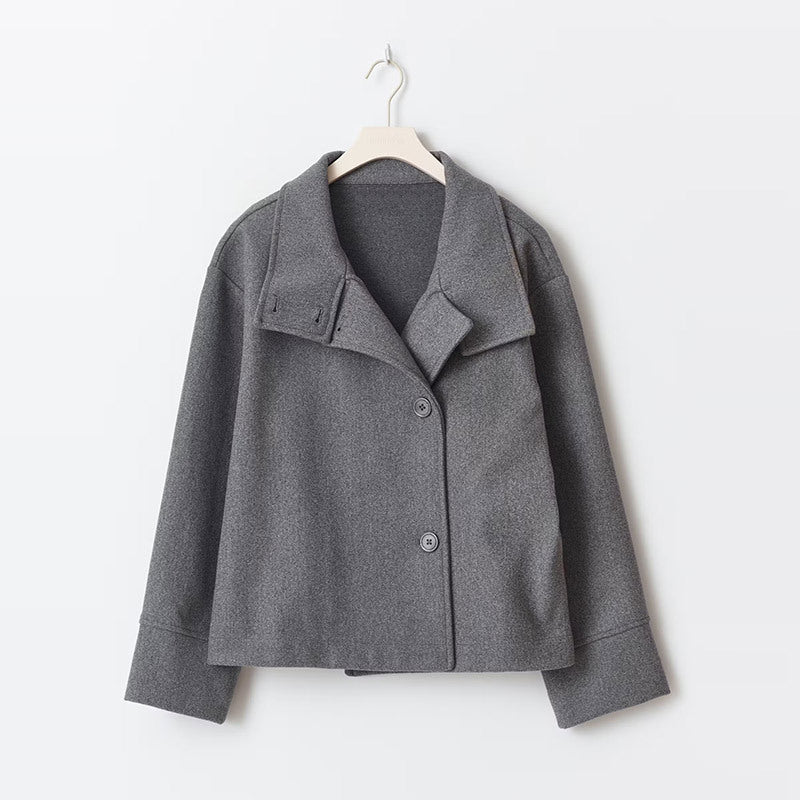 Fall fashion women's short coat with a relaxed fit, high neck, and elegant front button closure. Versatile outerwear.