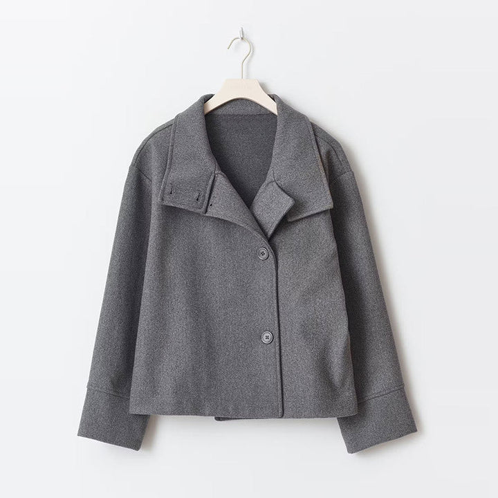 Fall fashion women's short coat with a relaxed fit, high neck, and elegant front button closure. Versatile outerwear.