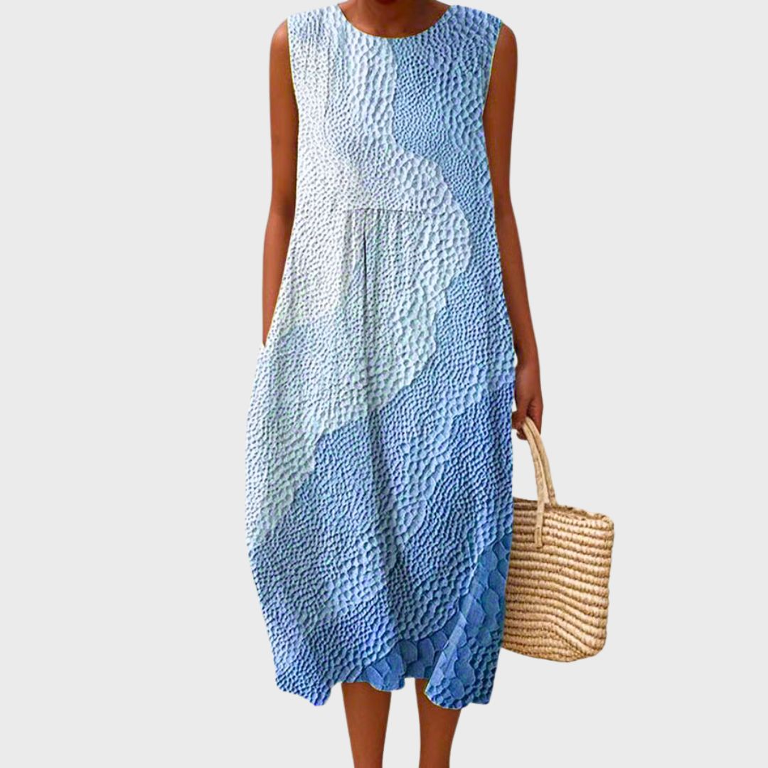 Comfortable women's sleeveless knee-length dress, relaxed fit for casual everyday wear. Versatile summer fashion.