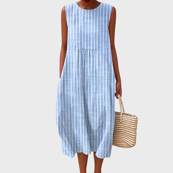 Women's summer dress: relaxed fit, sleeveless, knee-length, perfect for casual comfortable everyday wear.