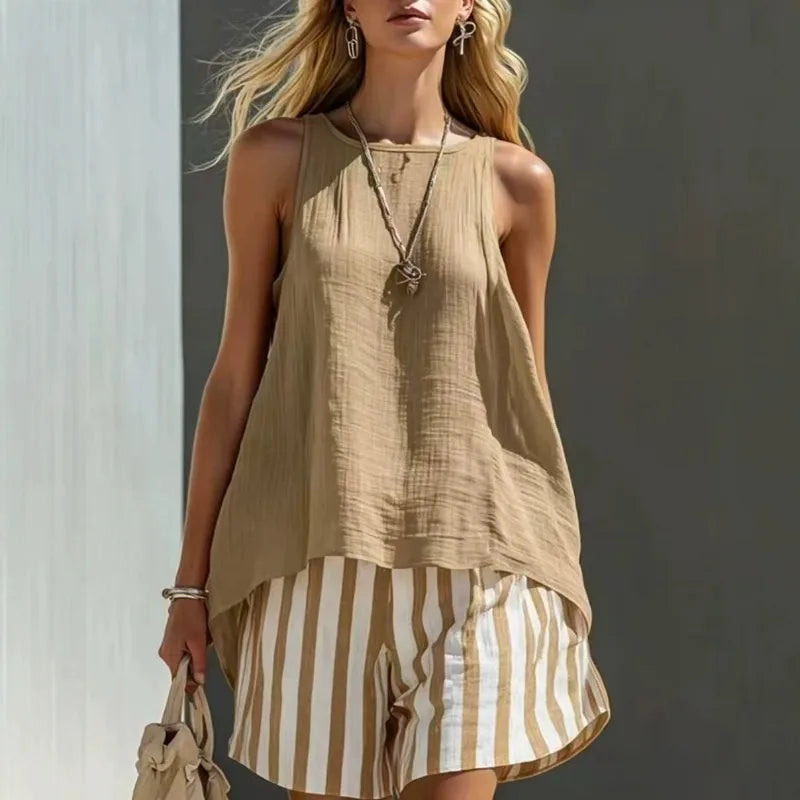 Casual women's summer set featuring a soft sleeveless tank top and chic striped shorts, ideal for vacation.