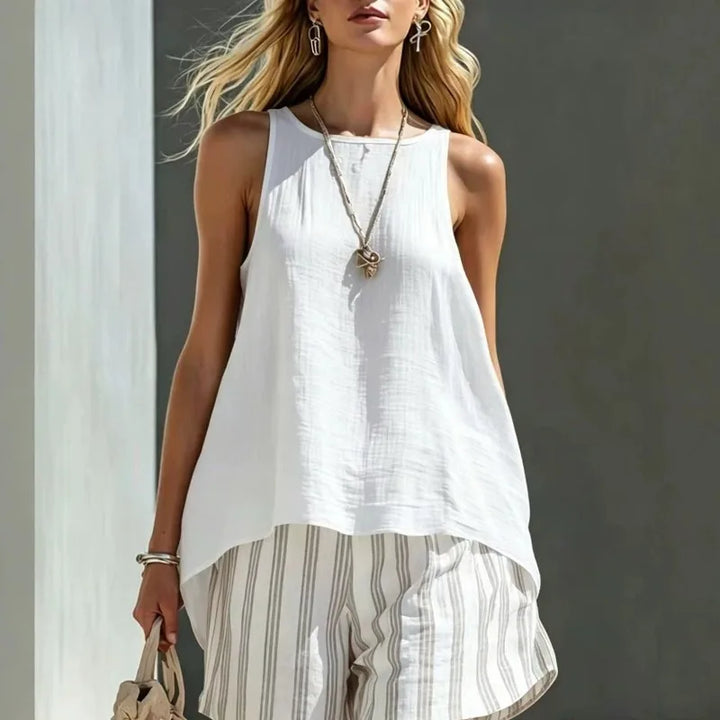 Trendy women's sleeveless tank and comfy striped shorts two-piece set, perfect for beach trips & vacation.