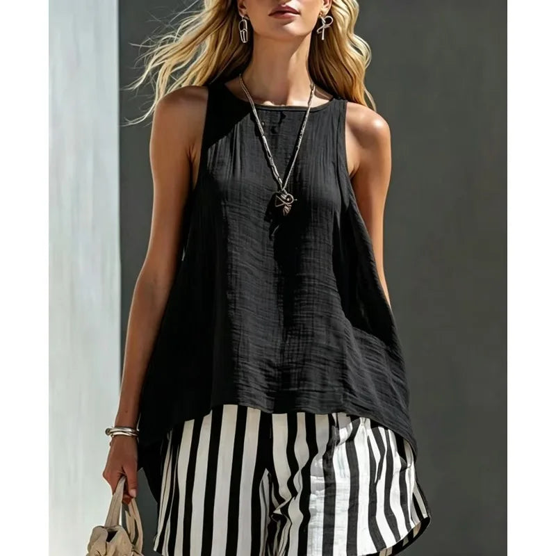 Versatile women's summer outfit: a relaxed sleeveless tank and striped shorts set for casual elegance.