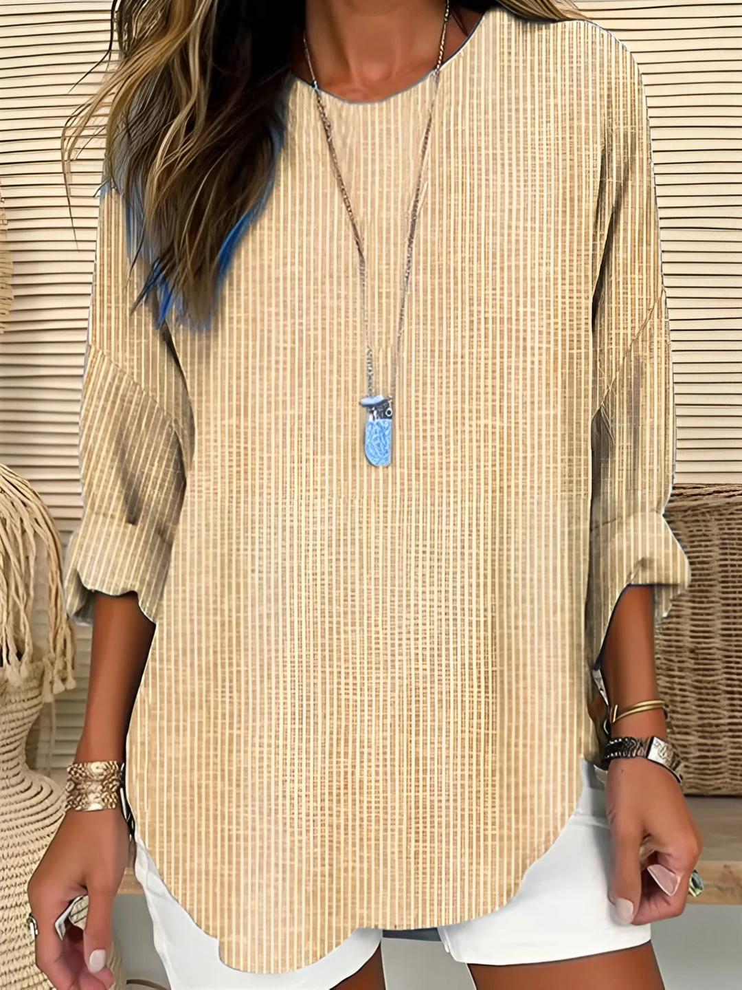 Chic women's striped long sleeve blouse with a relaxed fit, perfect for versatile casual wear. Comfortable & stylish.