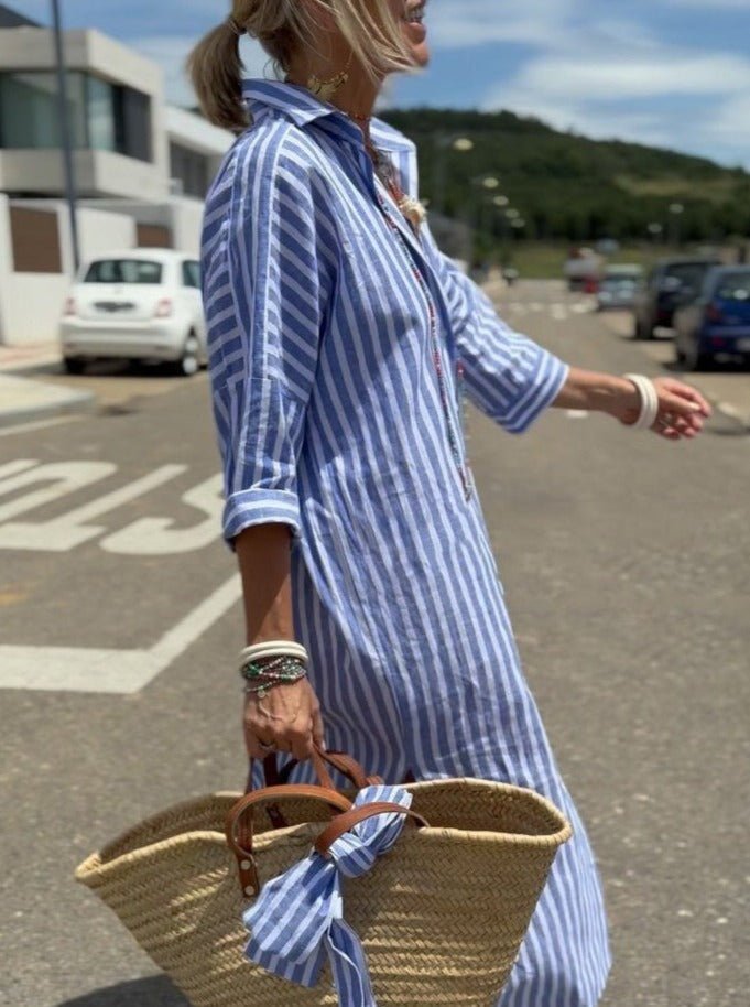 Pink striped button front midi shirt dress for women, offering a relaxed fit, ideal for casual everyday wear.