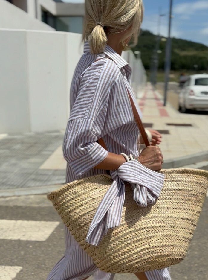 Blue striped relaxed fit midi shirt dress with button front closure, a stylish women's casual summer dress.