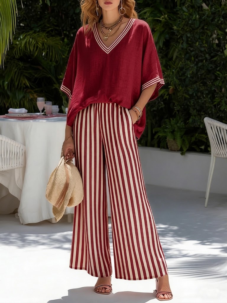 Women's relaxed fit striped V-neck shirt paired with comfortable wide-leg pants, a stylish two-piece summer casual set.