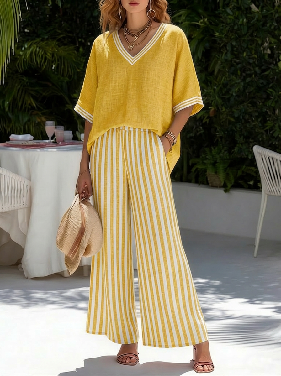 Stylish women's striped two-piece set: relaxed fit shirt and wide leg pants, a versatile and chic casual outfit.