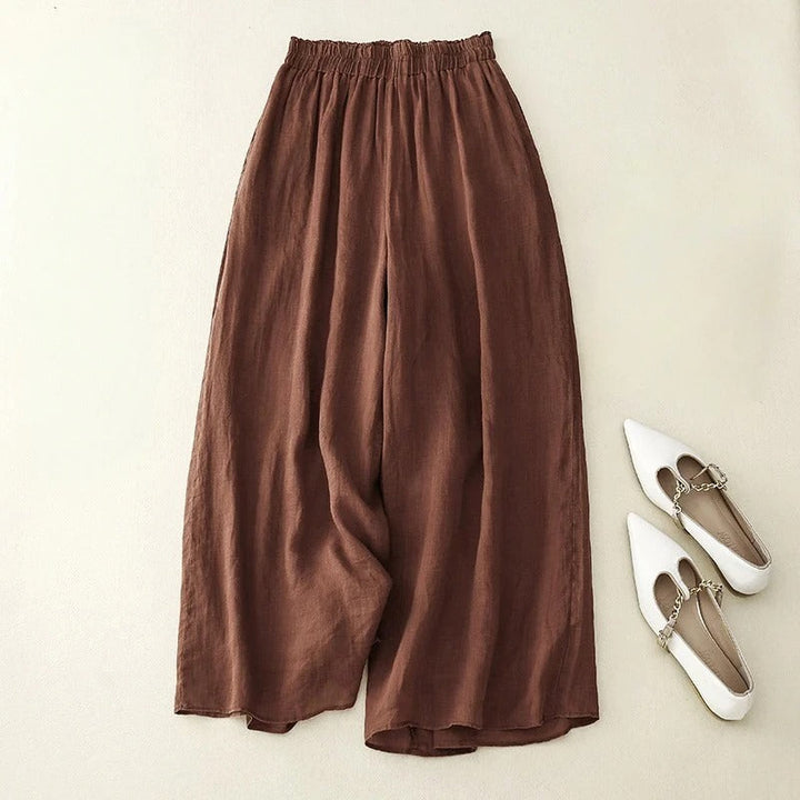 Women's relaxed fit trousers with loose waistband in a comfortable, flowy style, perfect for casual summer wear.