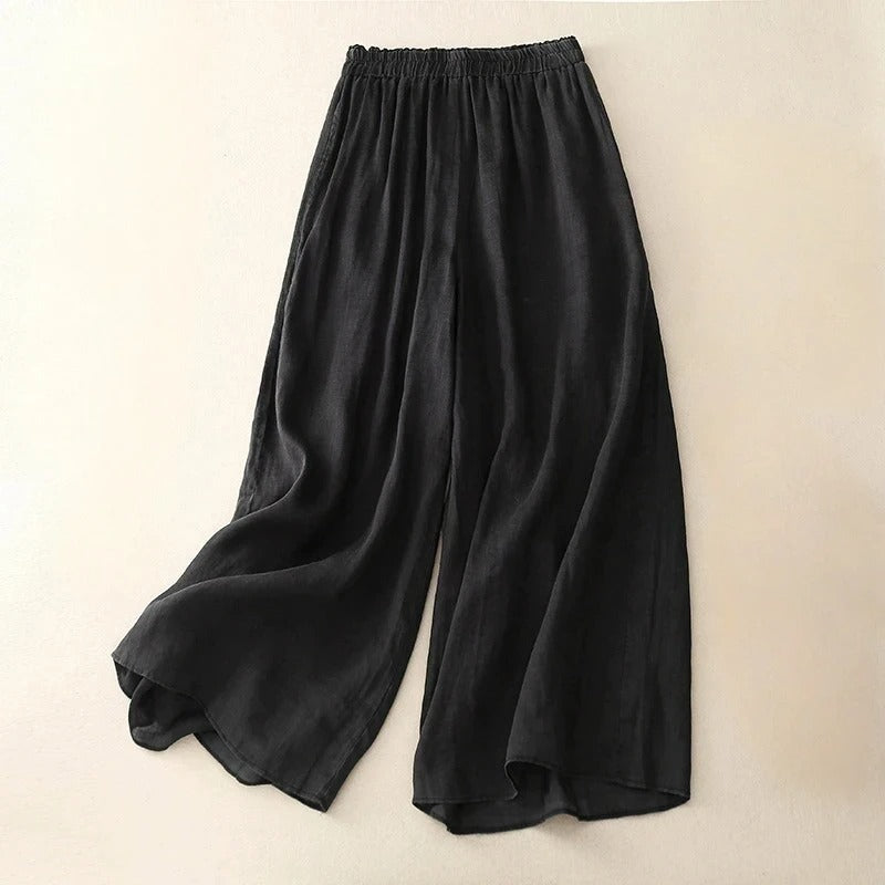 Flowy women's trousers with a loose waistband and relaxed straight leg, ideal for comfortable, versatile wear.