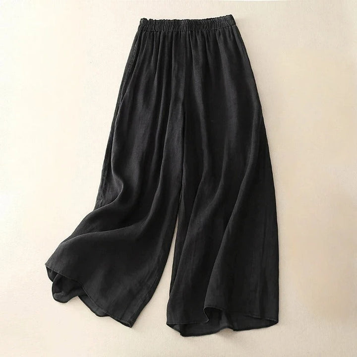 Flowy women's trousers with a loose waistband and relaxed straight leg, ideal for comfortable, versatile wear.